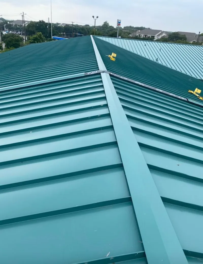 Green commercial metal roof ridge and valley for Metal Roof Repair in Brock Hall
